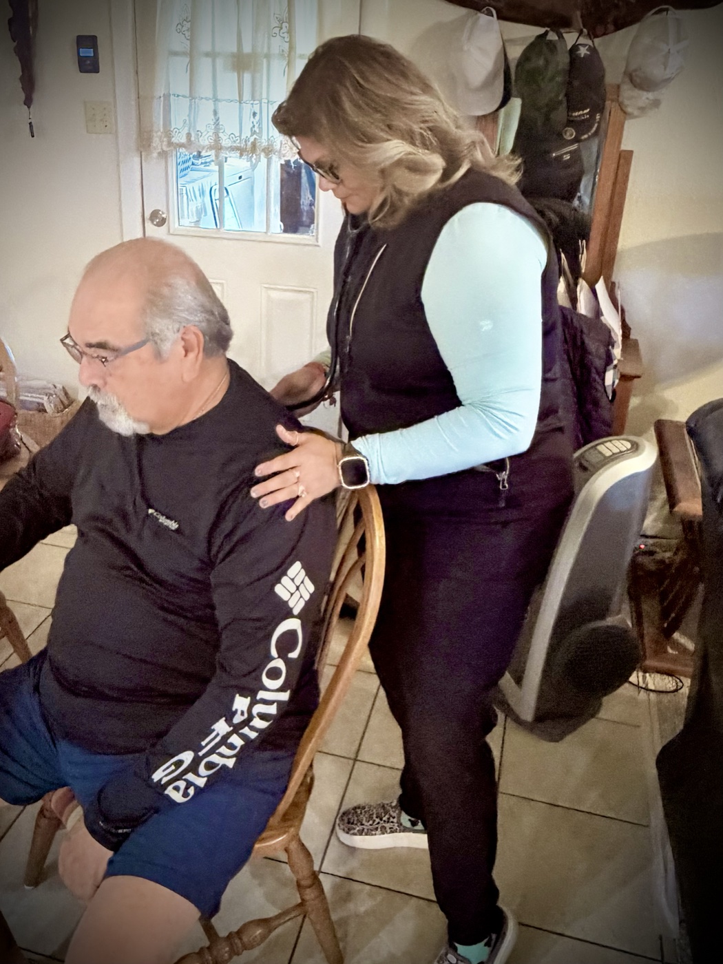 Provider performing a patient assessment in a home setting